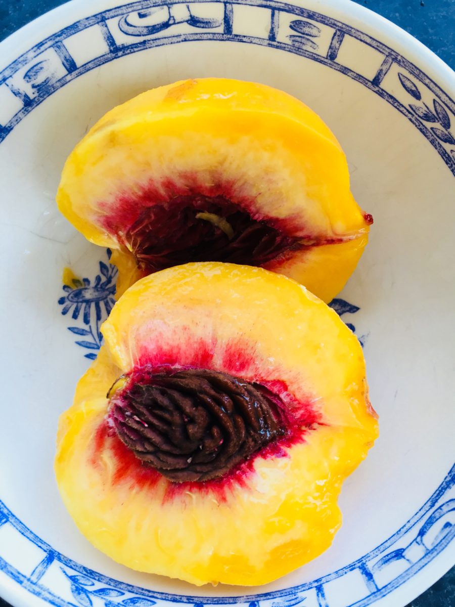 the perfect peach, halved